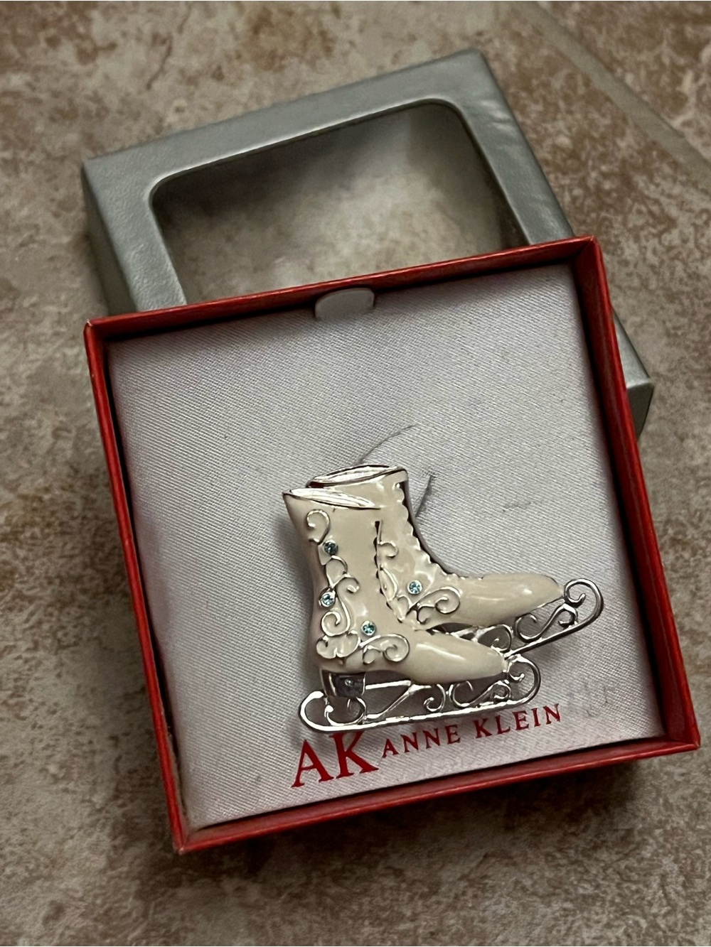 Anne Klein Cream and Silver Enamel Ice Skate Brooch with Blue Accents